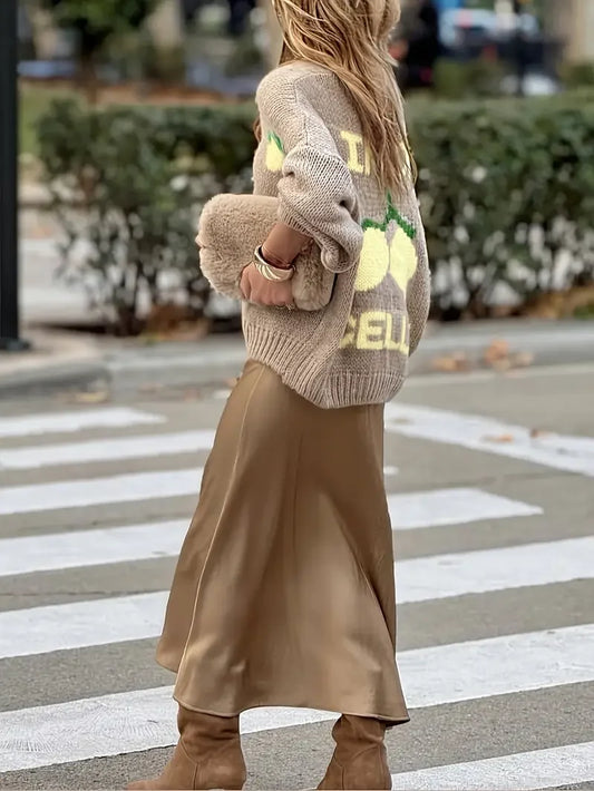 Zijaanzicht lichtgele cardigan met lantern mouwen – BRUNELLE